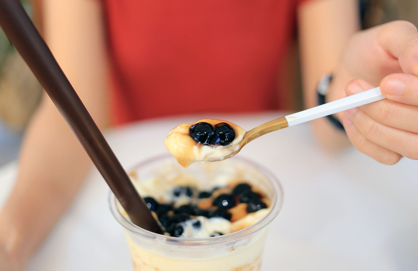 boba with pearls in spoon