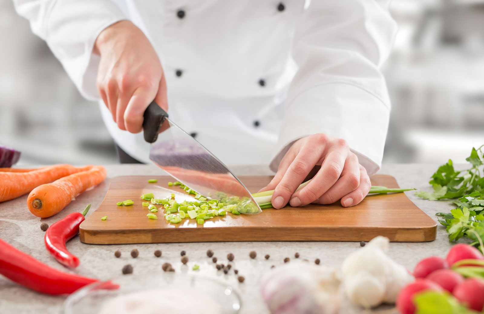 cook chopping vegetables