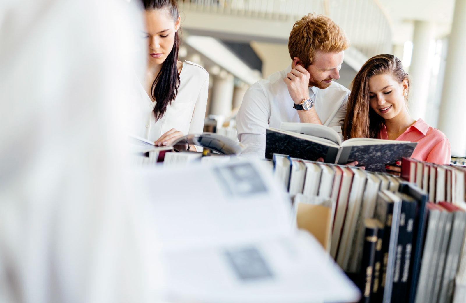 couple checking out books