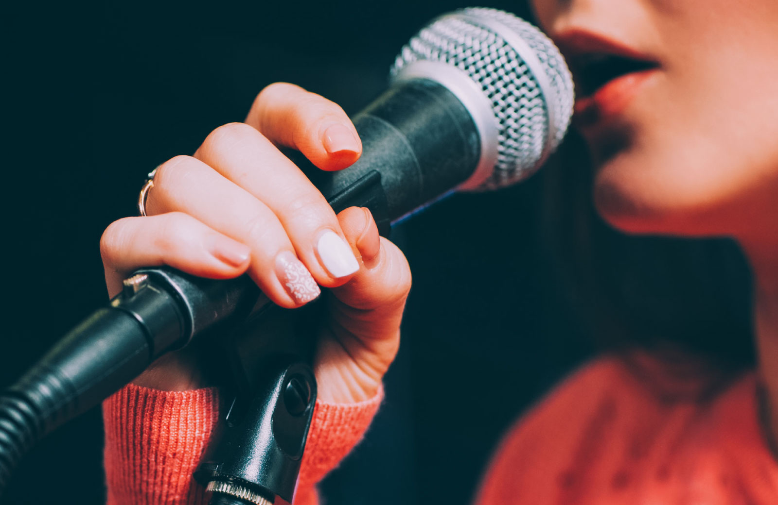 person holding a mic