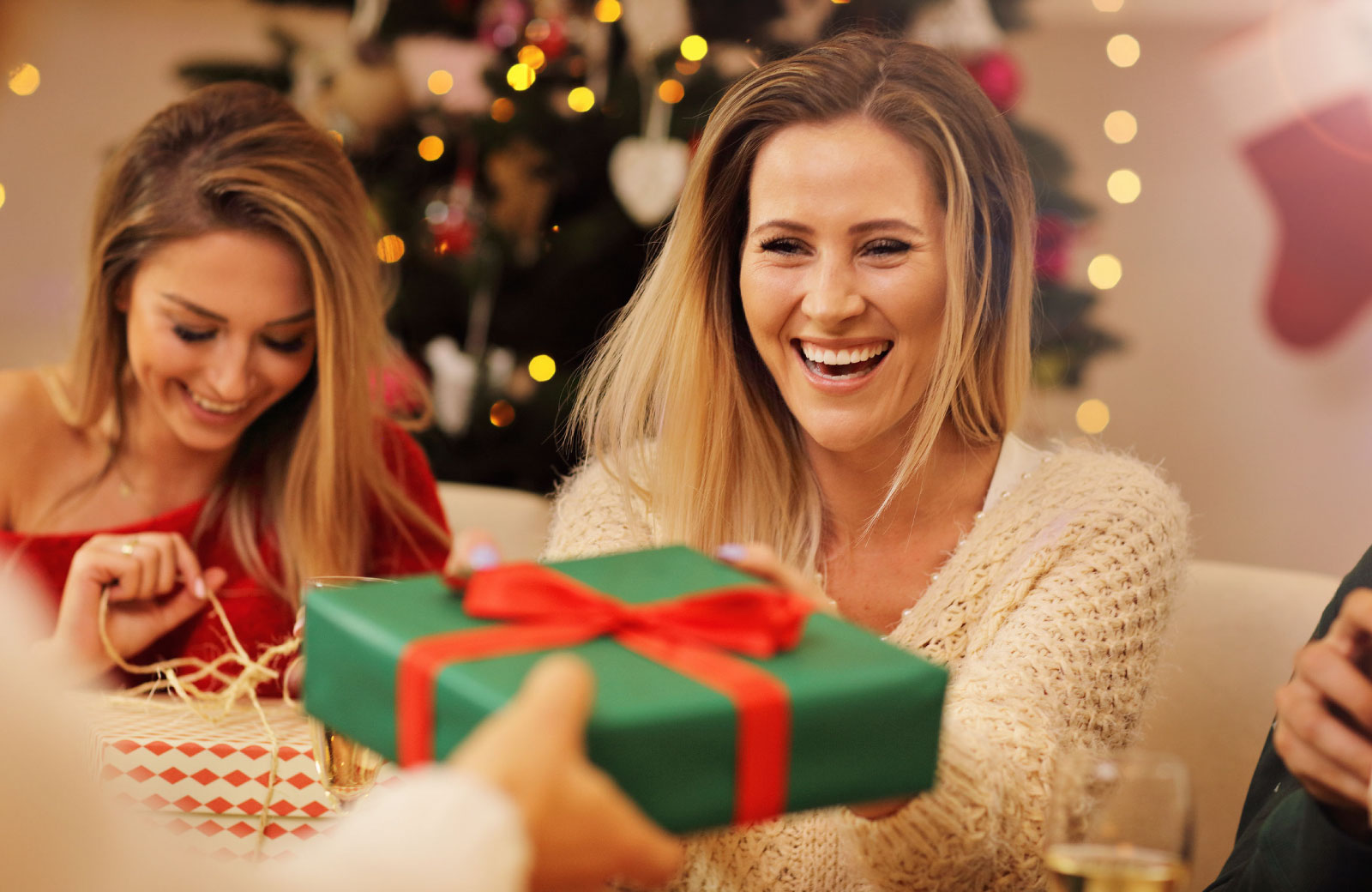 woman handing out gifts
