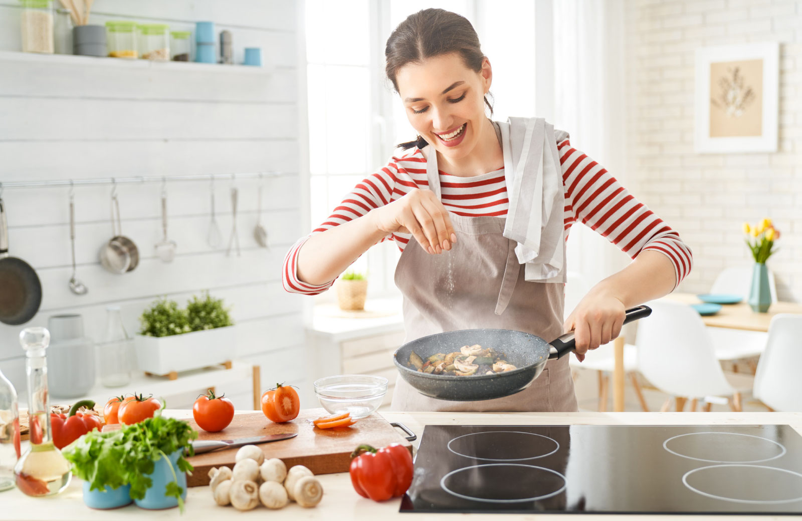 woman cooking a healthy meal