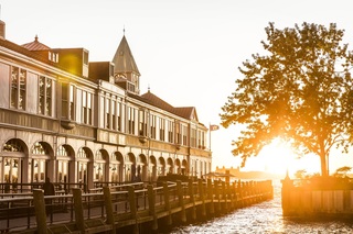 Waterfront building in Battery Park at sunset.