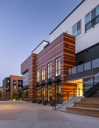Exterior twilight of Origin apartments in Superior