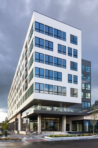 Tall modern apartment building in Denver, CO