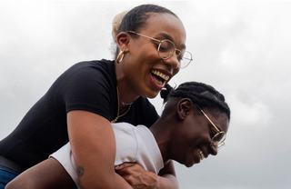 Friend giving piggyback ride