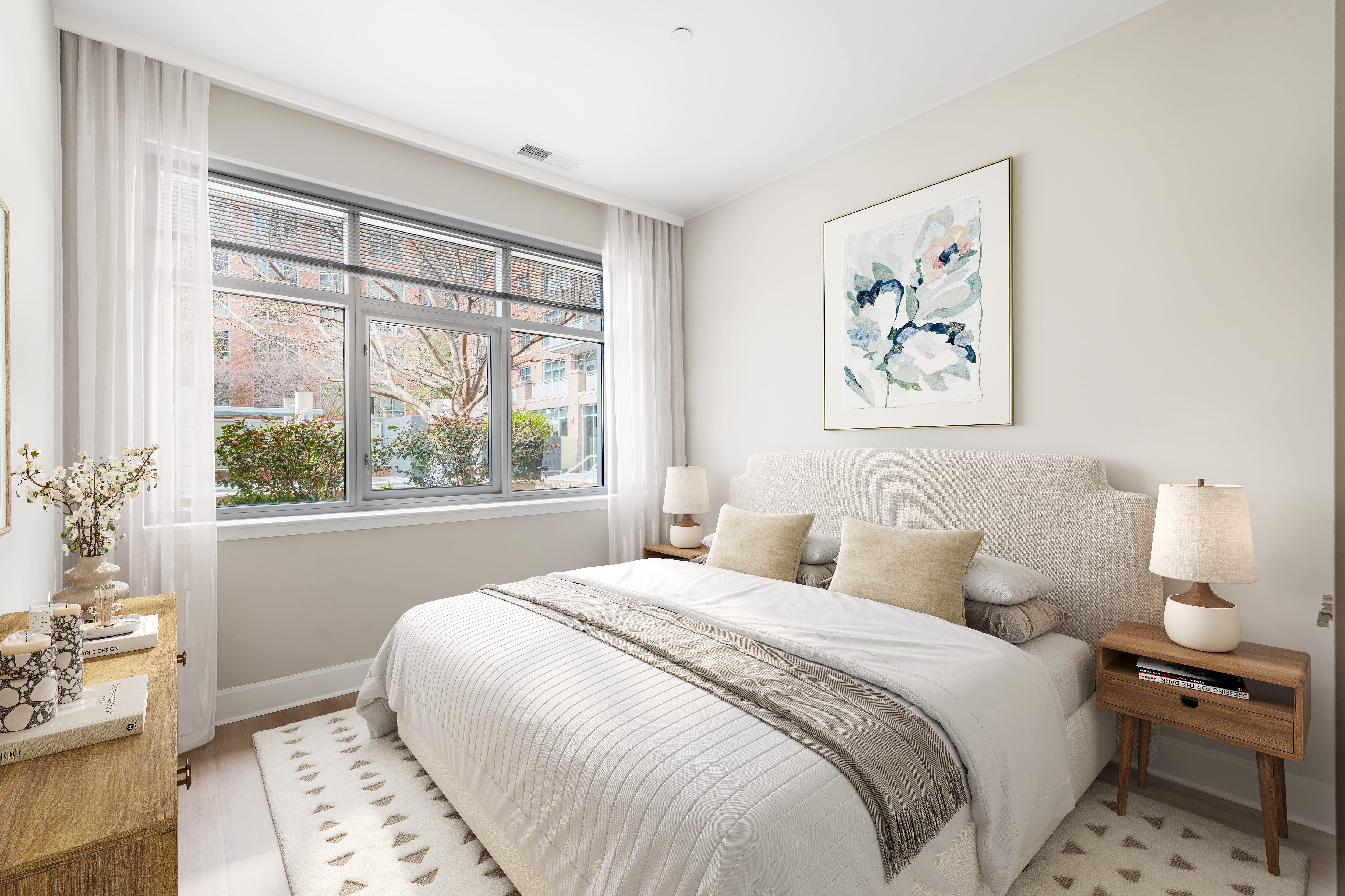 Bedroom with desk next to bed