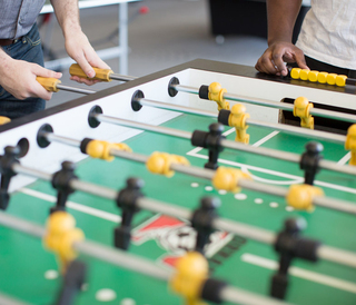 Sol at West Village Apt Amenities - Clubroom Foosball Table