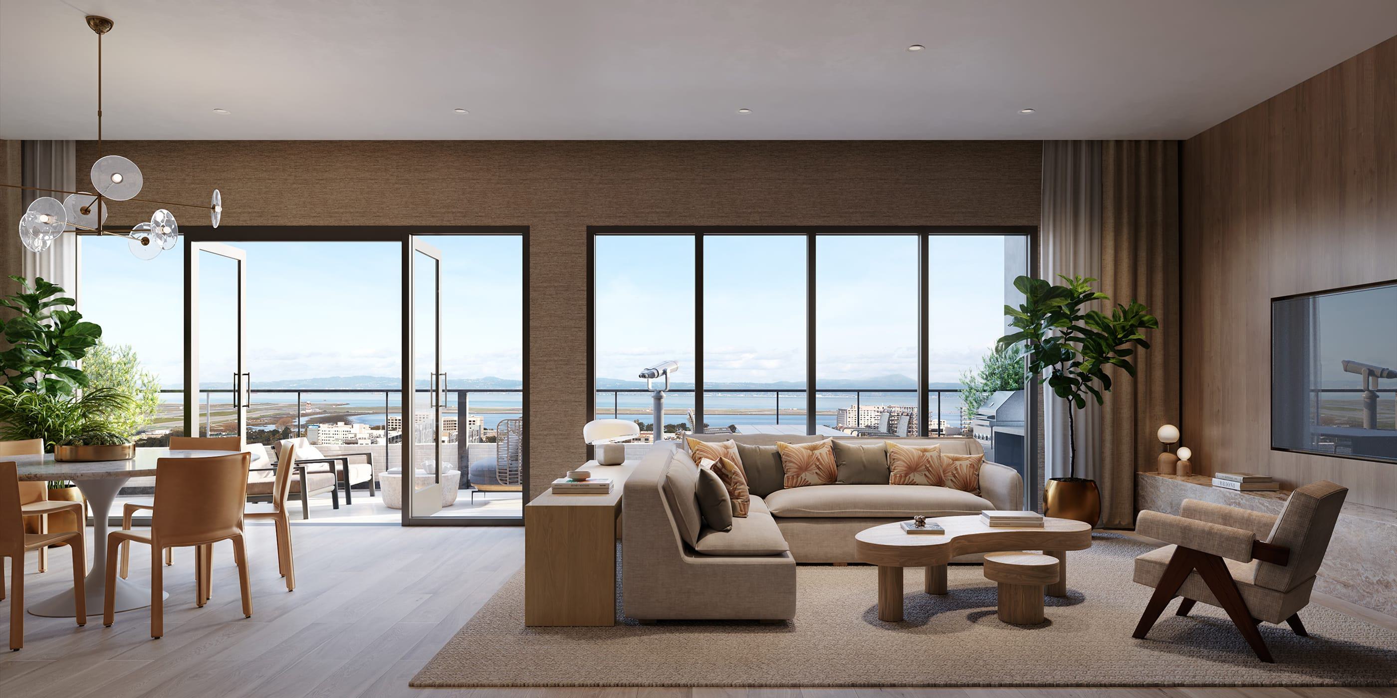 This bright, contemporary living room opens to a private balcony with sweeping views of the San Francisco Bay. Large windows frame the water and distant East Bay hills.
