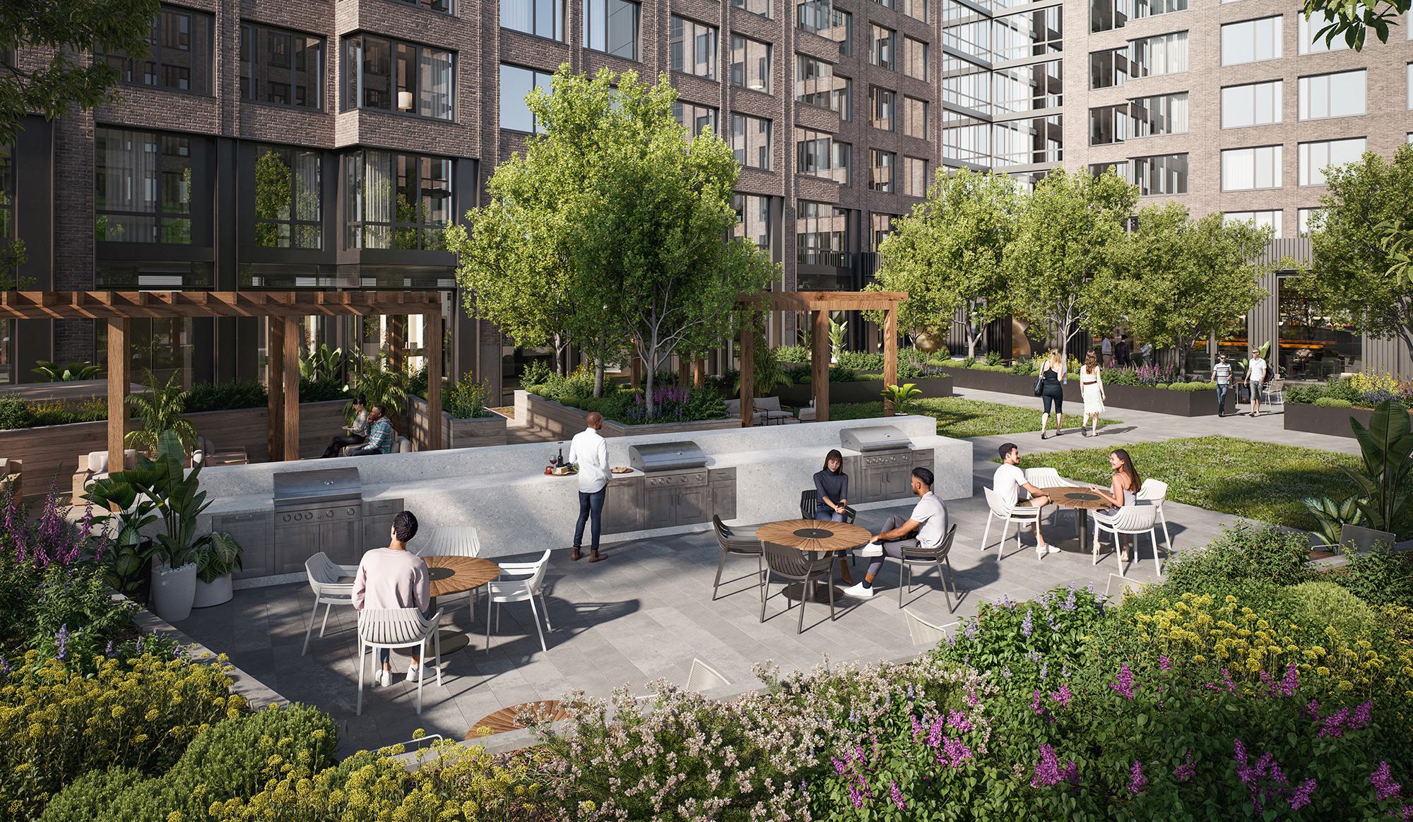 private interior courtyard at loden with lush greenery thoughtful planned spaces with chairs and tables, outdoor grills, a variety of different seating areas, walking paths, and shaded wooden pergolas, 