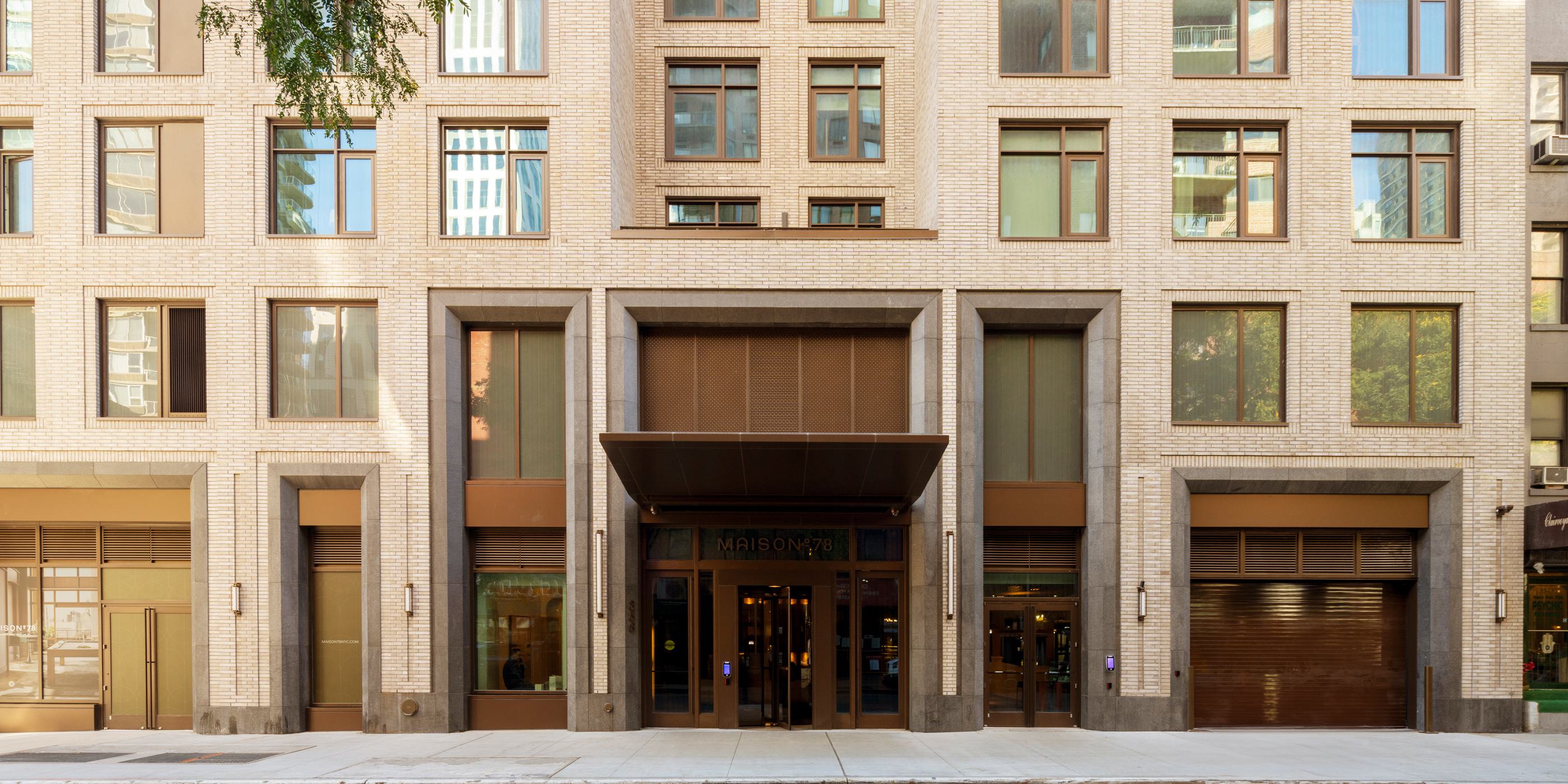 sleek, modern, and welcoming outdoor entryway area of Maison 78 on the Upper East Side