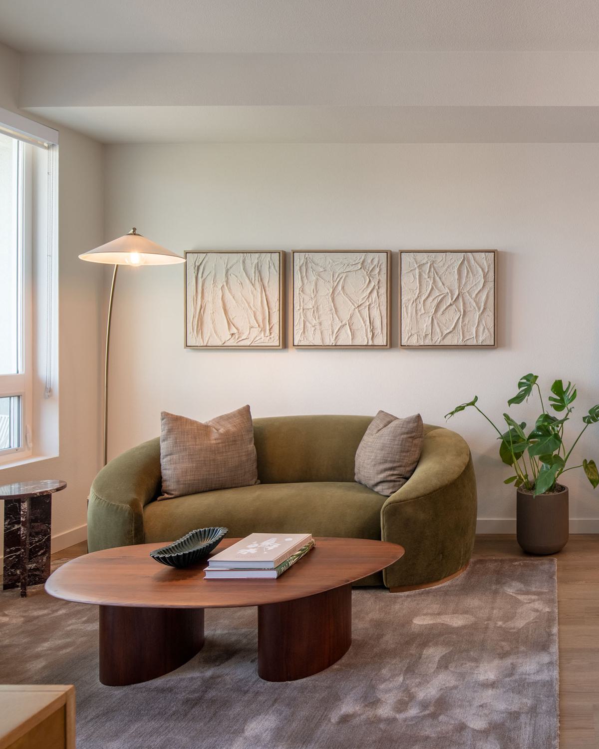 Spacious modern living and dining area with huge, oversized windows showcasing panoramic Hillcrest views and abundant natural light.