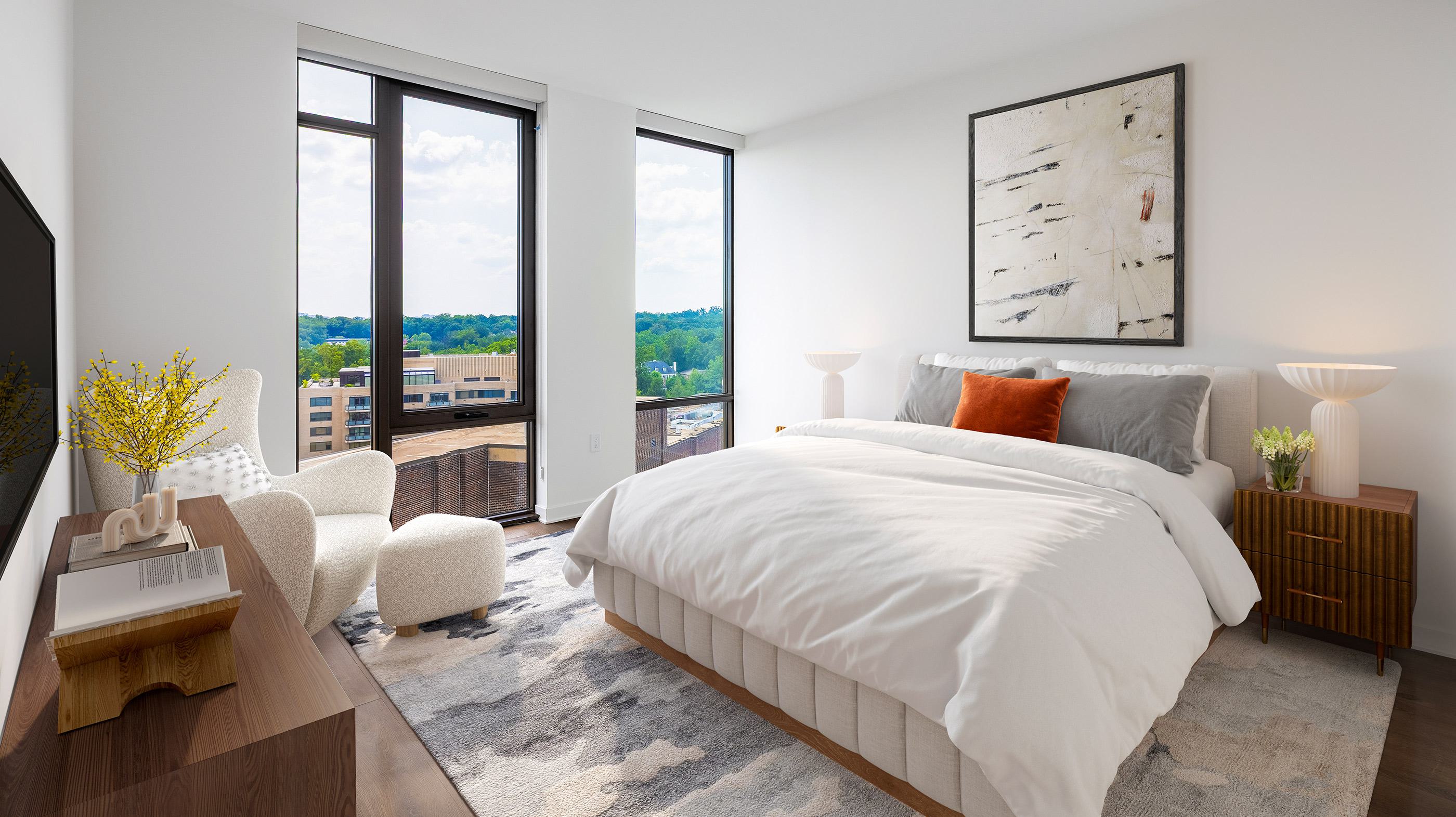 modern bedroom with soft gray walls, floor-to-ceiling windows, and warm wood furnishings, offering a DC cityscape view beyond the glass