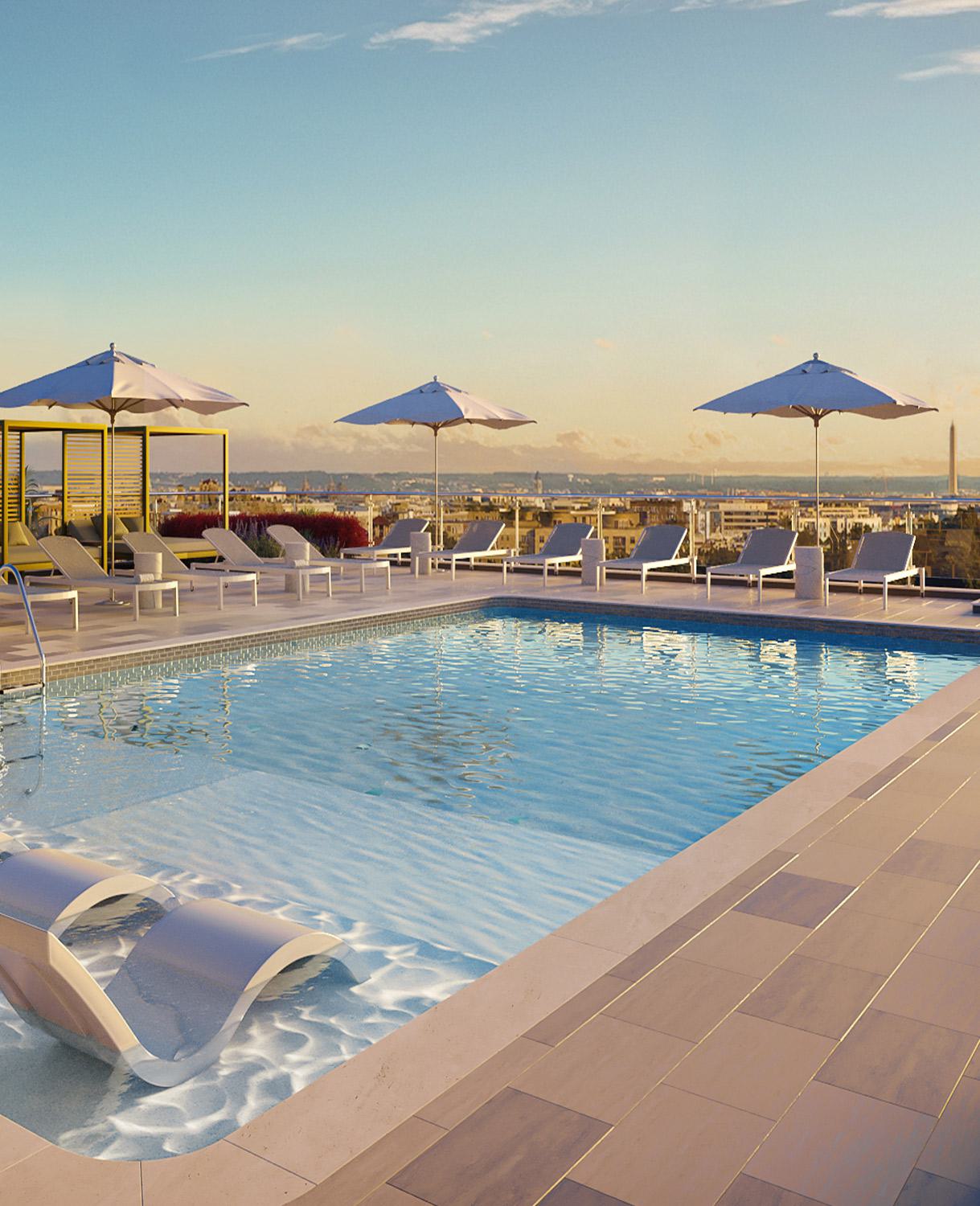 Roof Pool at Zephyr in Woodley Park, DC, featuring expansive views, loungers and cabanas.