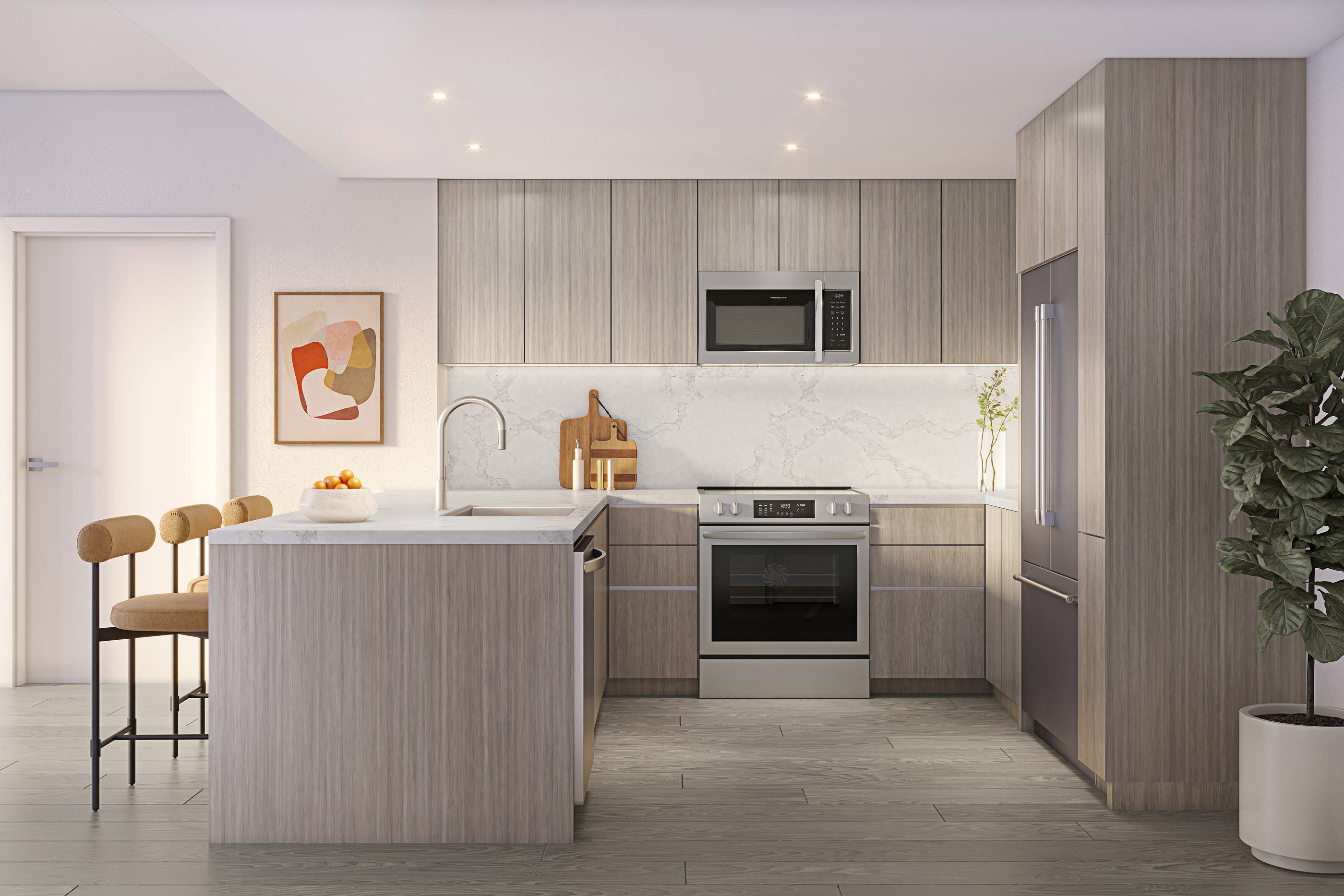 Modern kitchen at Zephyr in Woodley Park, DC, featuring light wood cabinetry, sleek integrated appliances, a marble backsplash, quartz countertops, and a peninsula with seating for two.