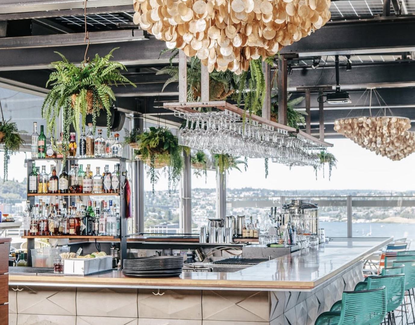 stylish interior of mbar with scenic views of south lake union