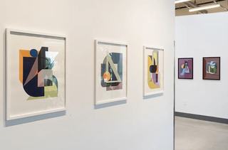white walls with colorful artwork at alto in a warehouse building art space at alto gallery in rino