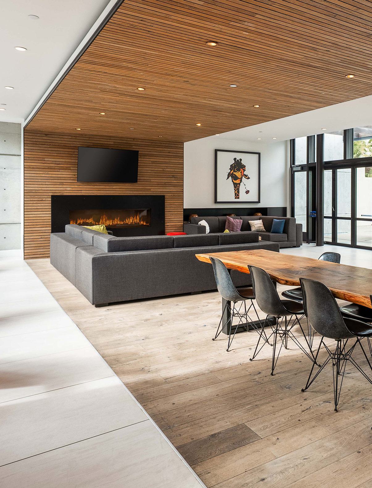 clubhouse with lounge furniture, kitchen and fireplace