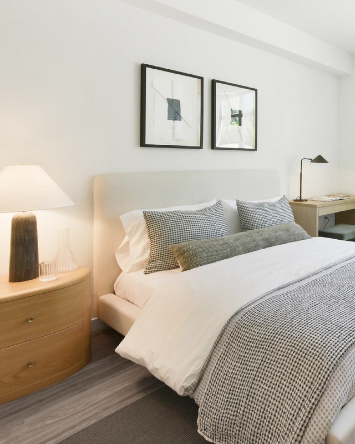 Cozy modern bedroom room with soft natural lighting.