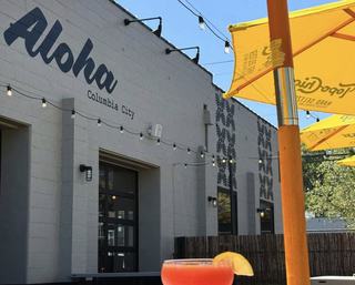 dog-friendly outdoor patio with umbrellas at marination