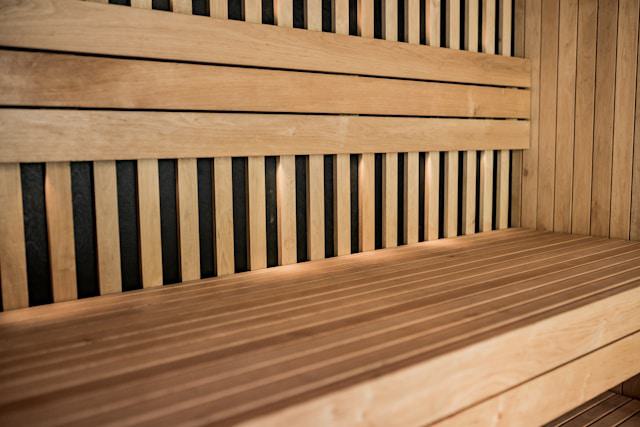 close up of wooden sauna benches