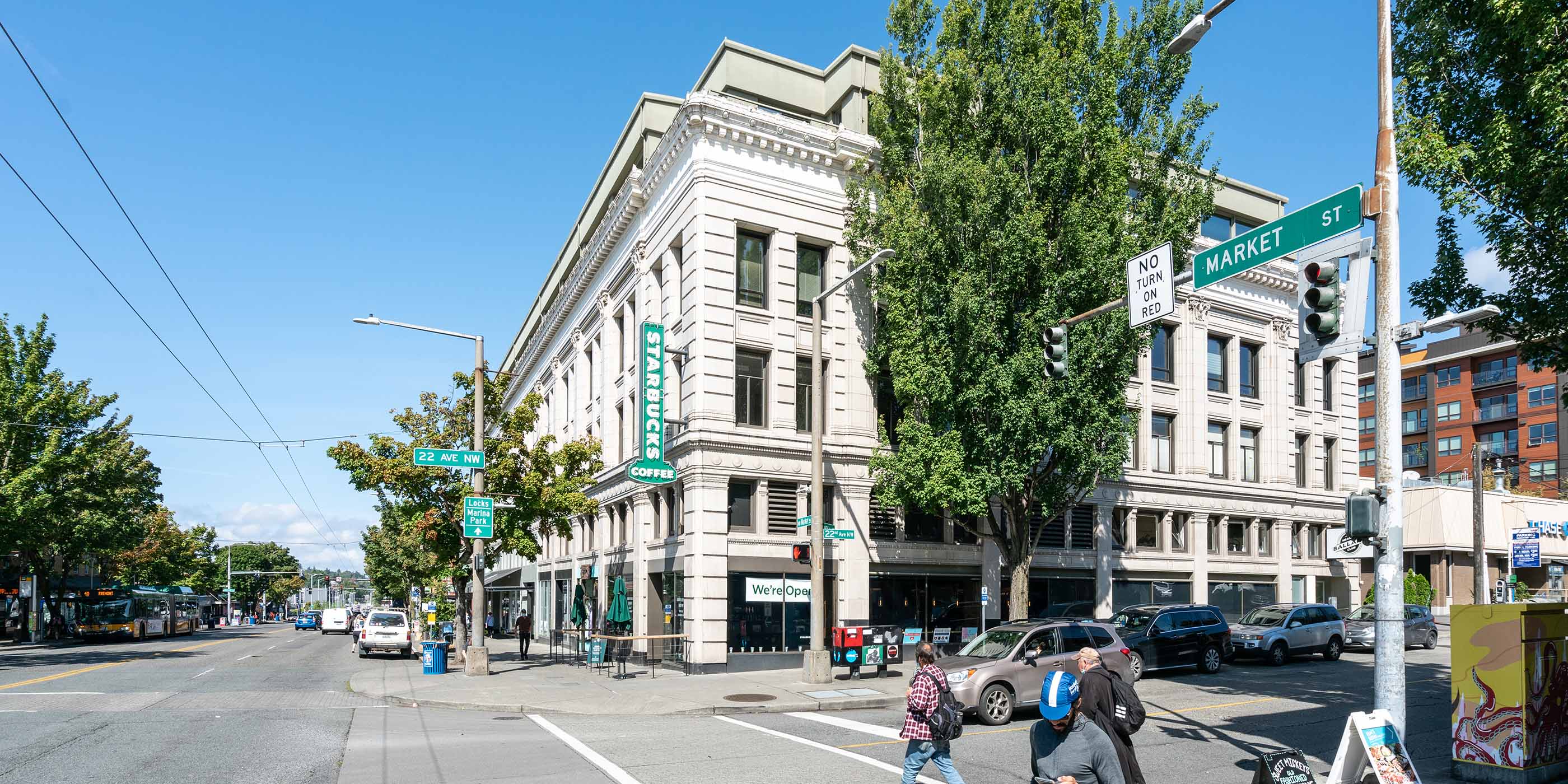 Corner view of a historic building housing Starbucks at 22nd Ave NW and NW Market Street in Ballard, Seattle.