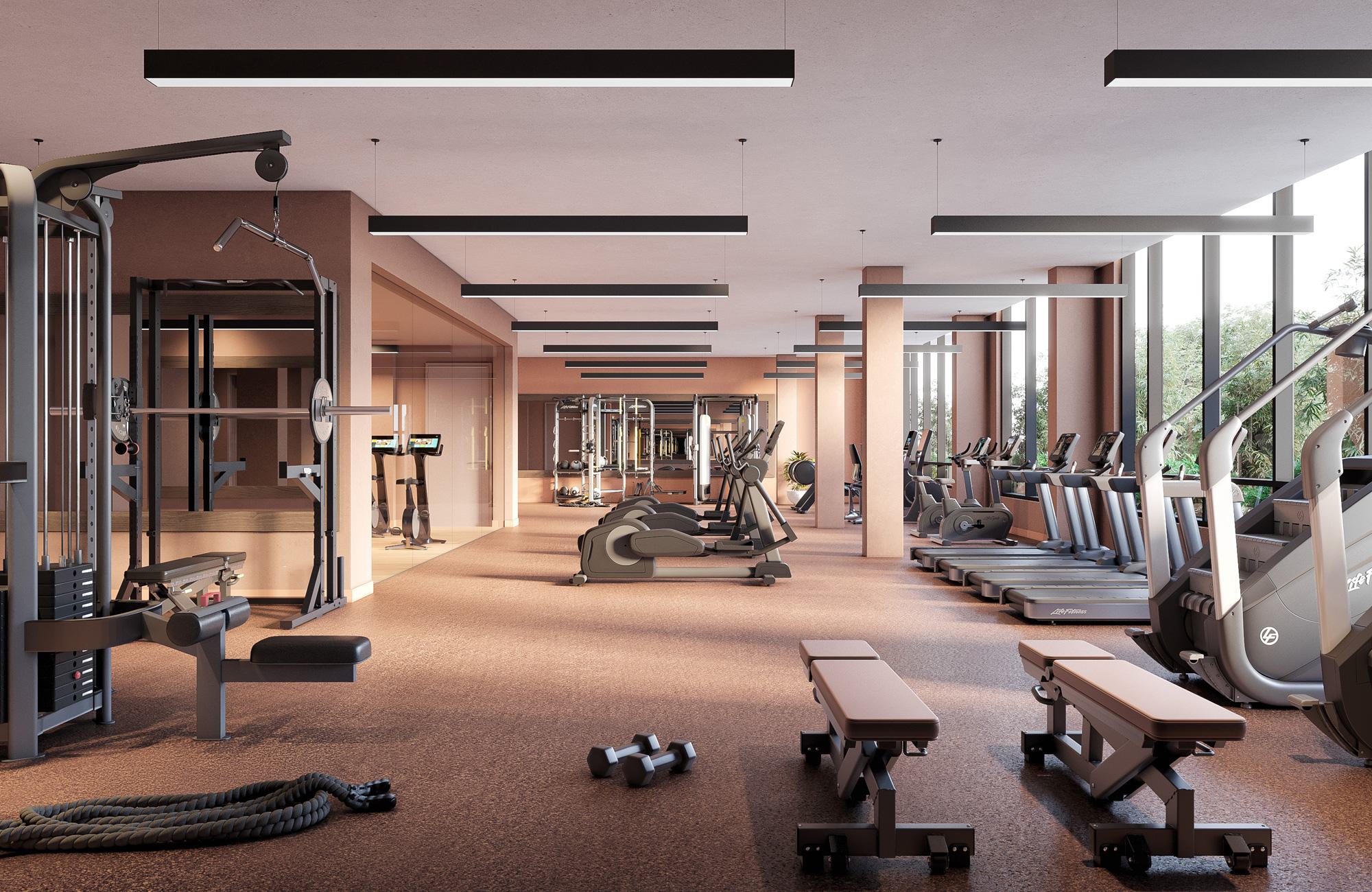 Spacious, modern fitness center with floor-to-ceiling windows, cardio machines including treadmills and ellipticals, strength training equipment, benches, free weights, and sleek linear ceiling lights in a warm, neutral-toned interior.