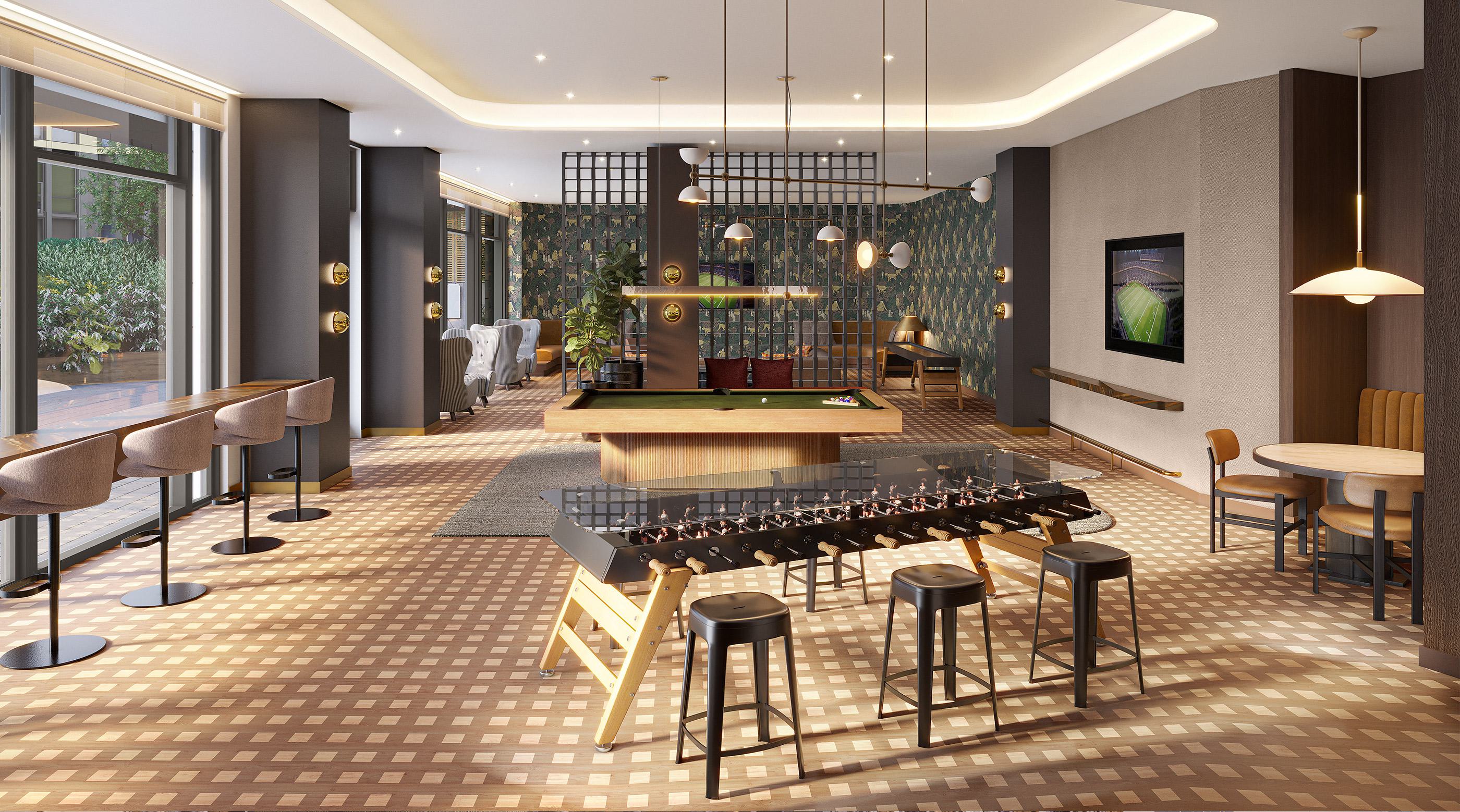 Game lounge at Zephyr in Woodley Park, DC, featuring a pool table, foosball table, bar-style seating, and cozy booths, with warm lighting and floor-to-ceiling windows overlooking landscaped outdoor areas.