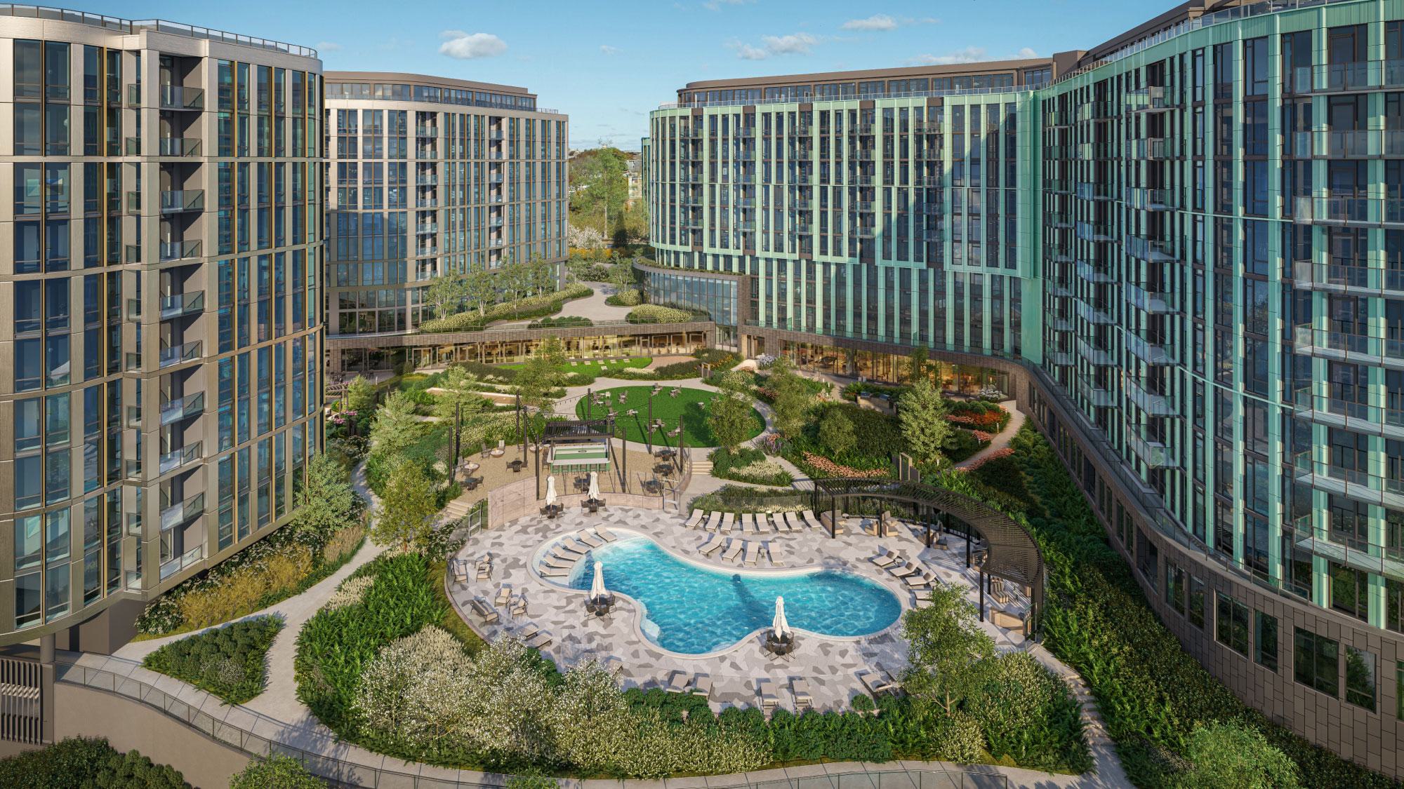 Courtyard view of Wardman Park in Northwest Washington, DC, featuring landscaped gardens, a resort-style pool with lounge chairs and umbrellas, and surrounding modern apartment towers with glass balconies.