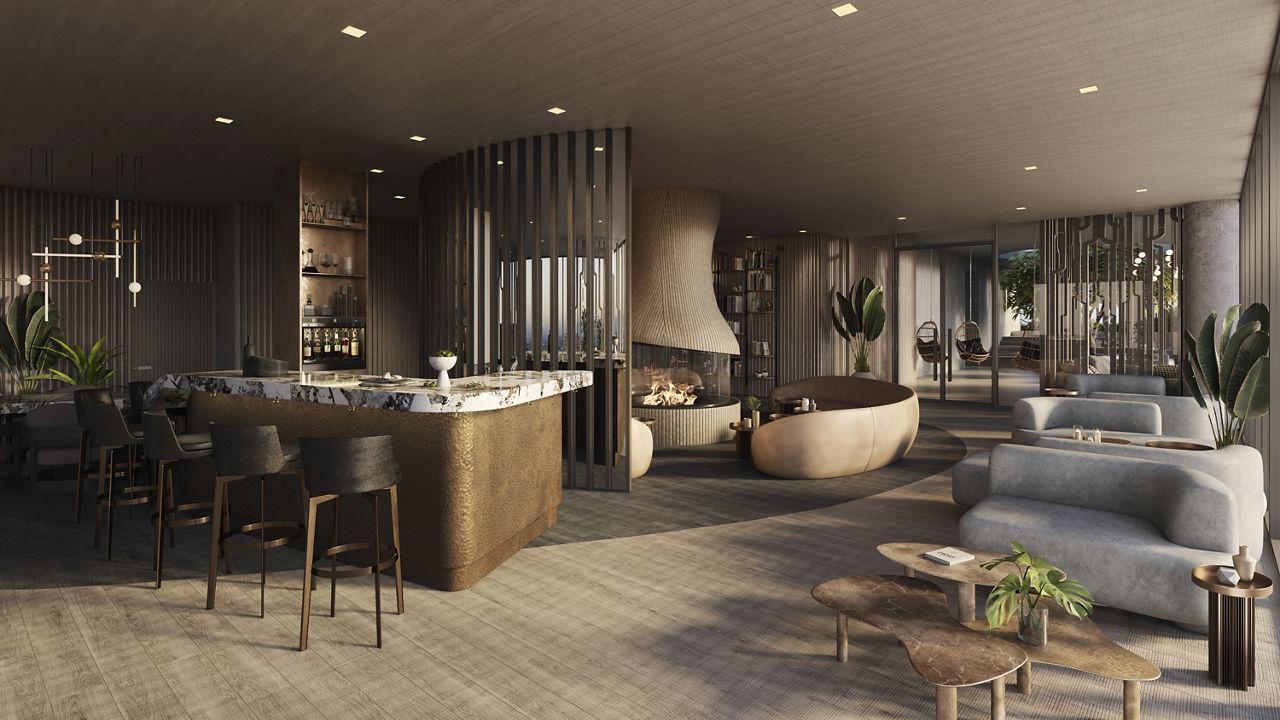 Wide view of rooftop lounge showing sculptural fireplace, curved seating areas, golden bar, and expansive windows. Modern design with warm wood tones, stone surfaces, and abundant natural lighting.