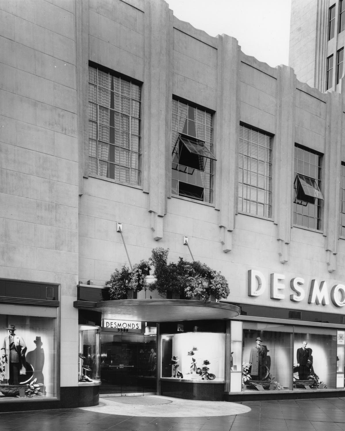 Historic photo of Desmond’s store on Wilshire Boulevard near Miracle Mile, showcasing Art Deco architecture and vintage window displays.