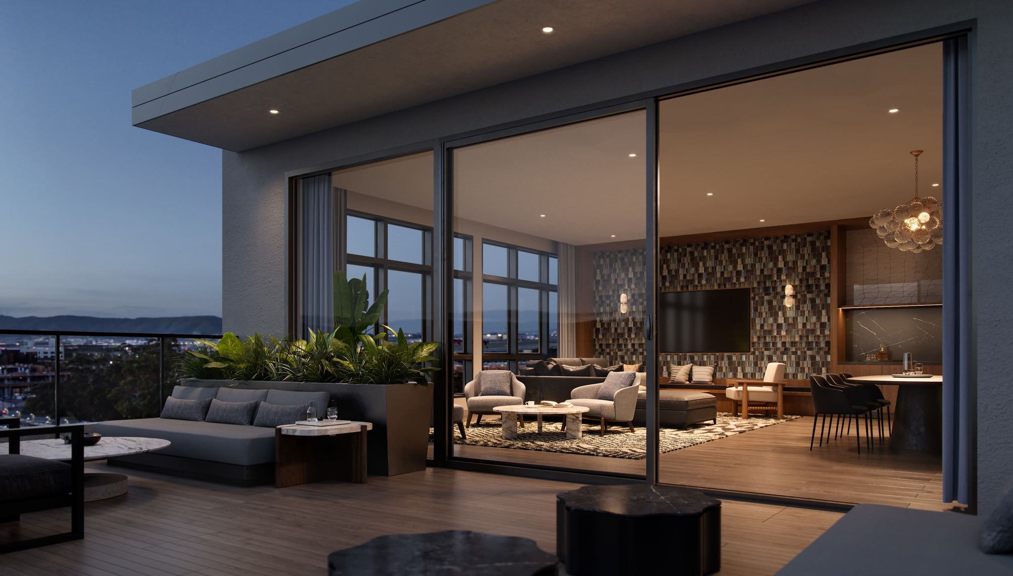 Interior of the Fog Lounge at Revery in Burlingame, featuring dark wood finishes, mosaic tile wall, lounge seating, and an adjoining rooftop deck with greenery and city views at dusk.