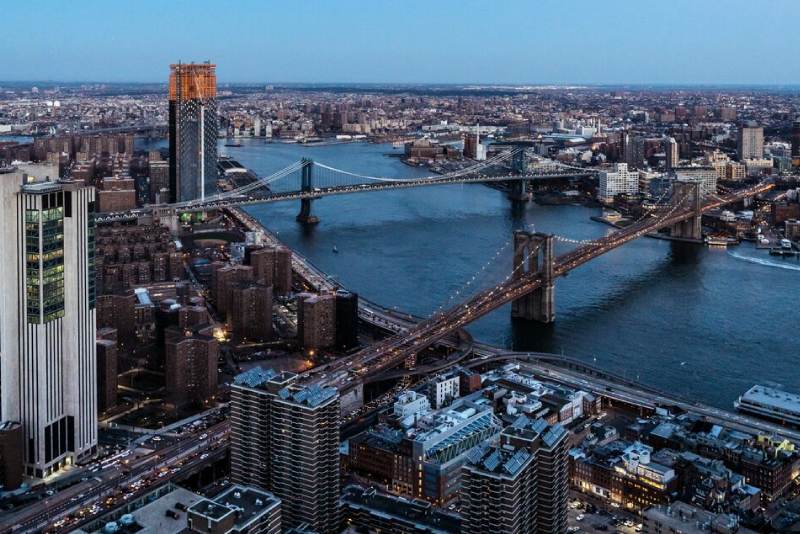 aerial view of the brooklyn bridge in NYC - high rise apts financial district