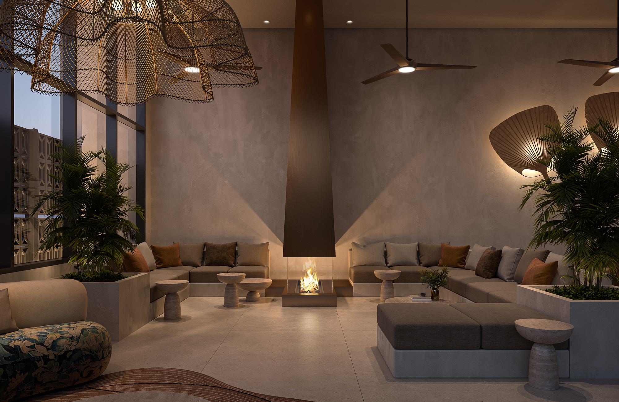 Resident lounge at Rowyn with suspended fireplace, wraparound seating, woven pendant lights, sculptural side tables, and textured neutral decor.