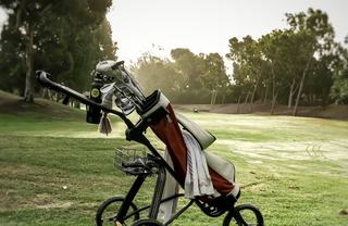 golf cart on a verdant green golf course in rancho park la