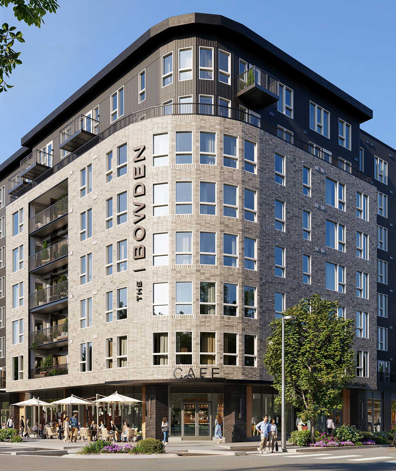Exterior view of The Bowden, a contemporary multi-story apartment building in Redmond, WA, situated at a strategic intersection in the Bel-Red corridor.