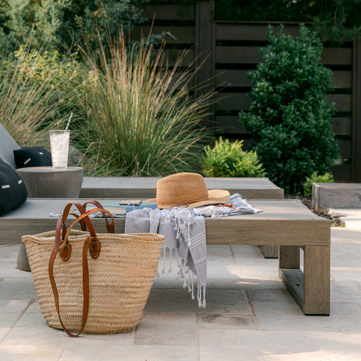 Outdoor lounge seating with hat, landscape and lounge chair