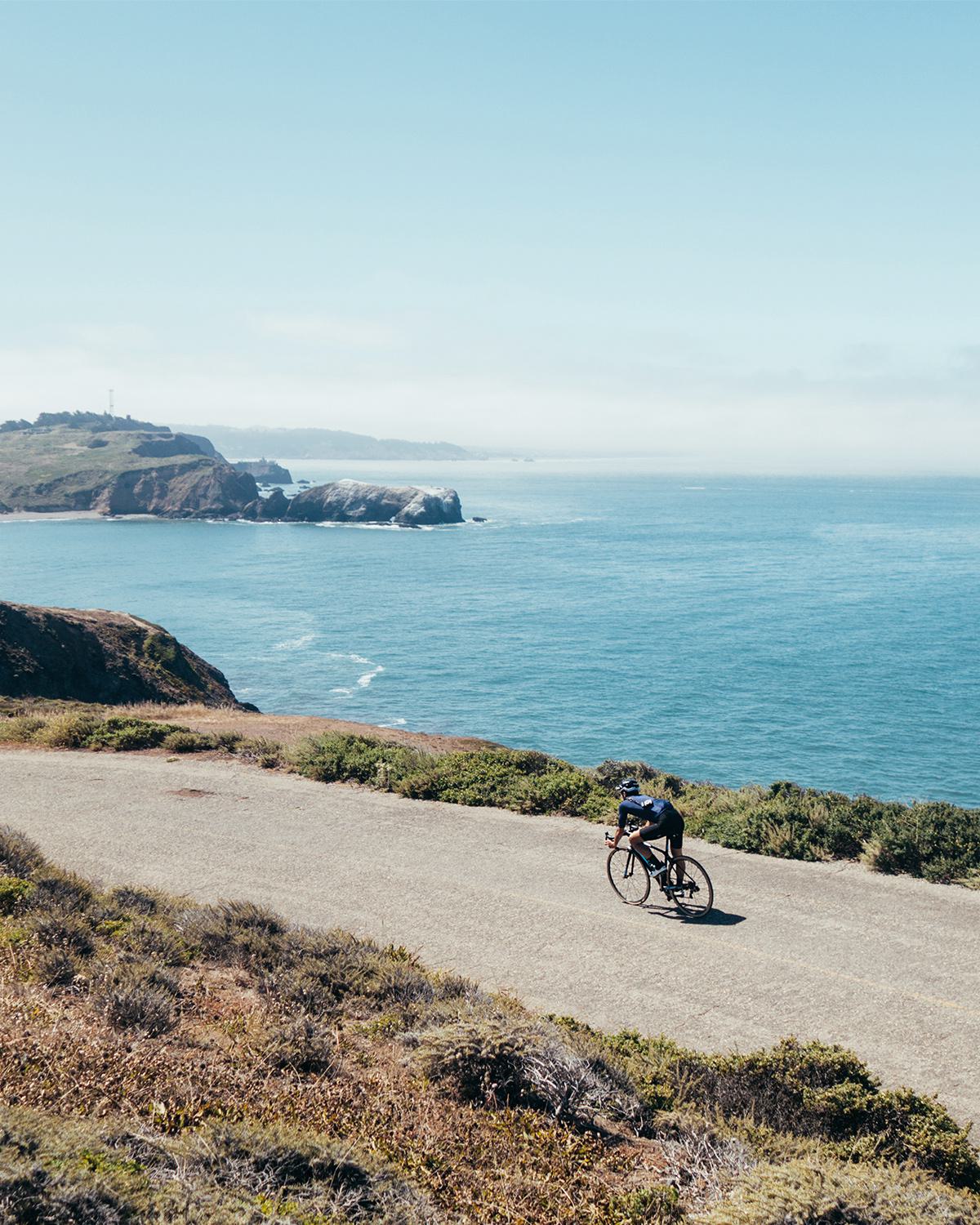 Biker along the water in Marin County