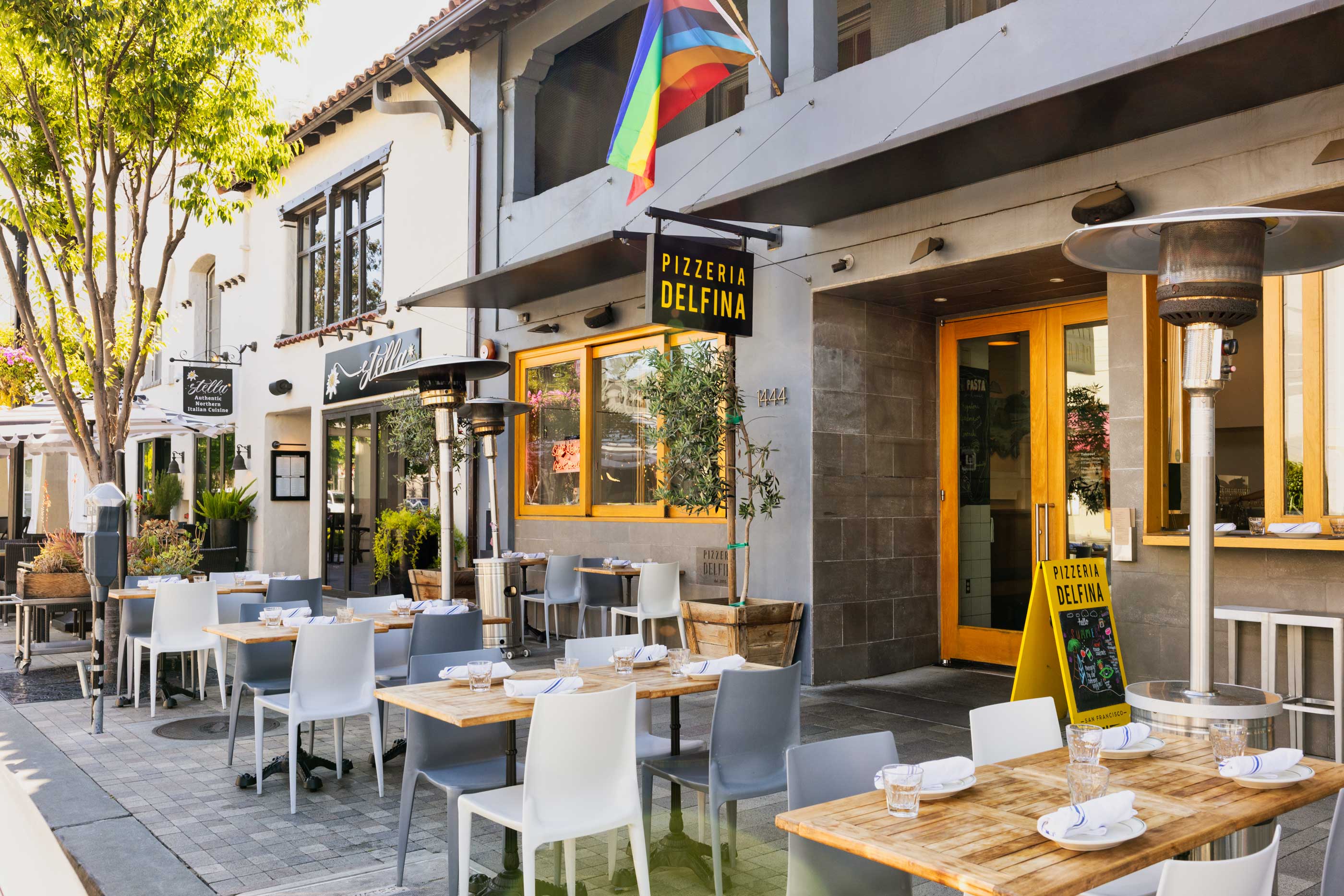 Outdoor dining along Burlingame Avenue featuring sidewalk tables and neighborhood restaurants.
