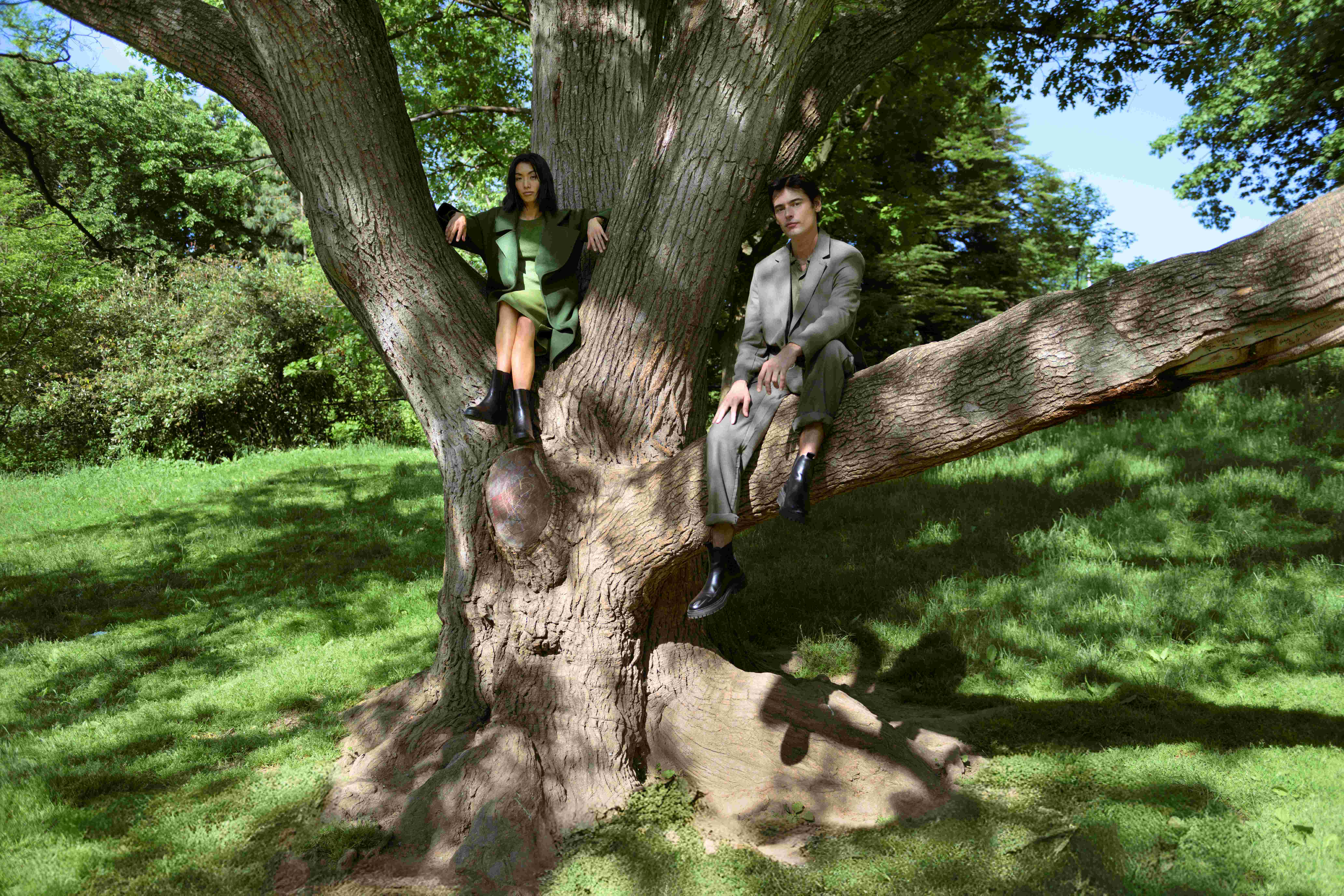 Branding image of models in a tree