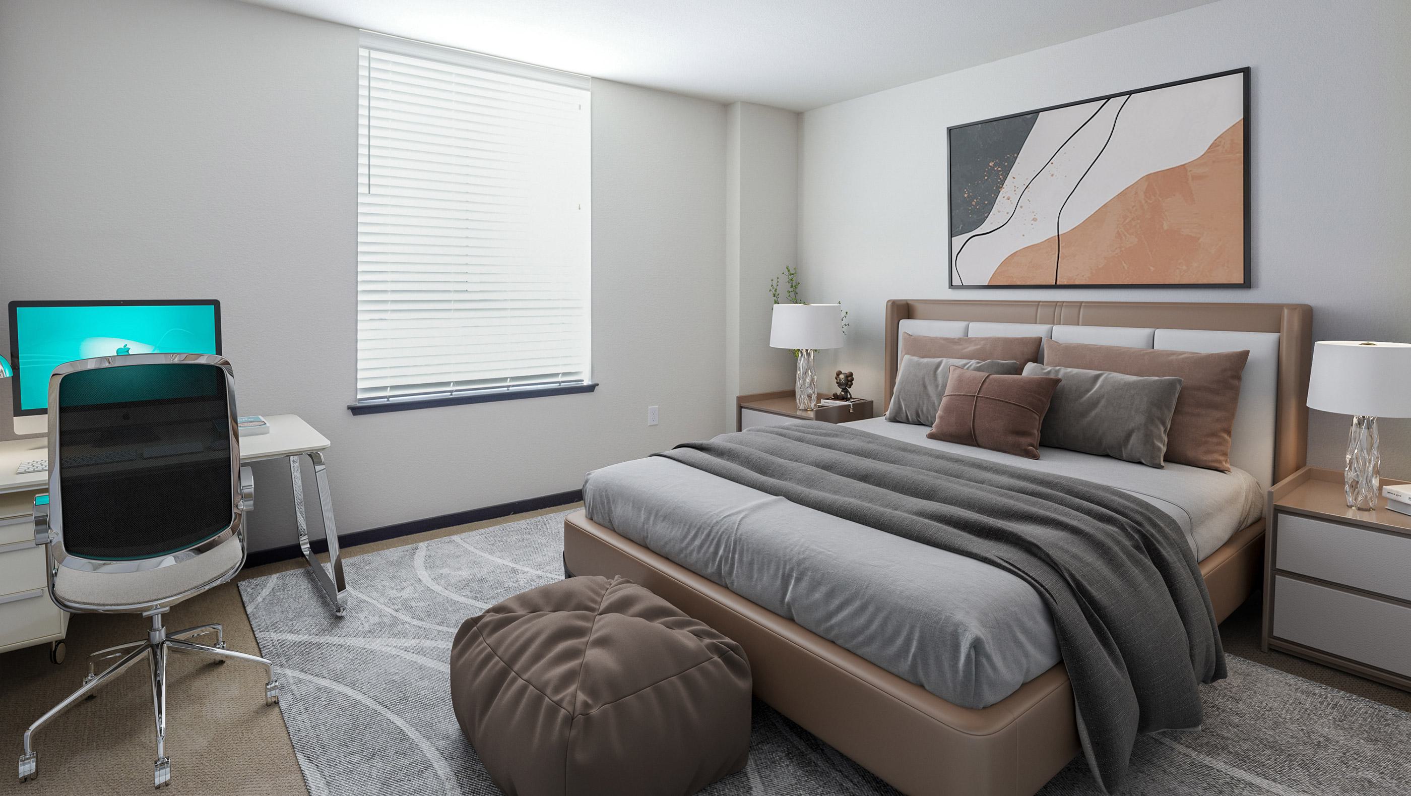 Modern model bedroom setup with dedicated workspace and wood-style flooring at Silver Apartments in San Jose, California.