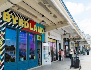 colorful storefront of Byrdland Records along a Union Market sidewalk