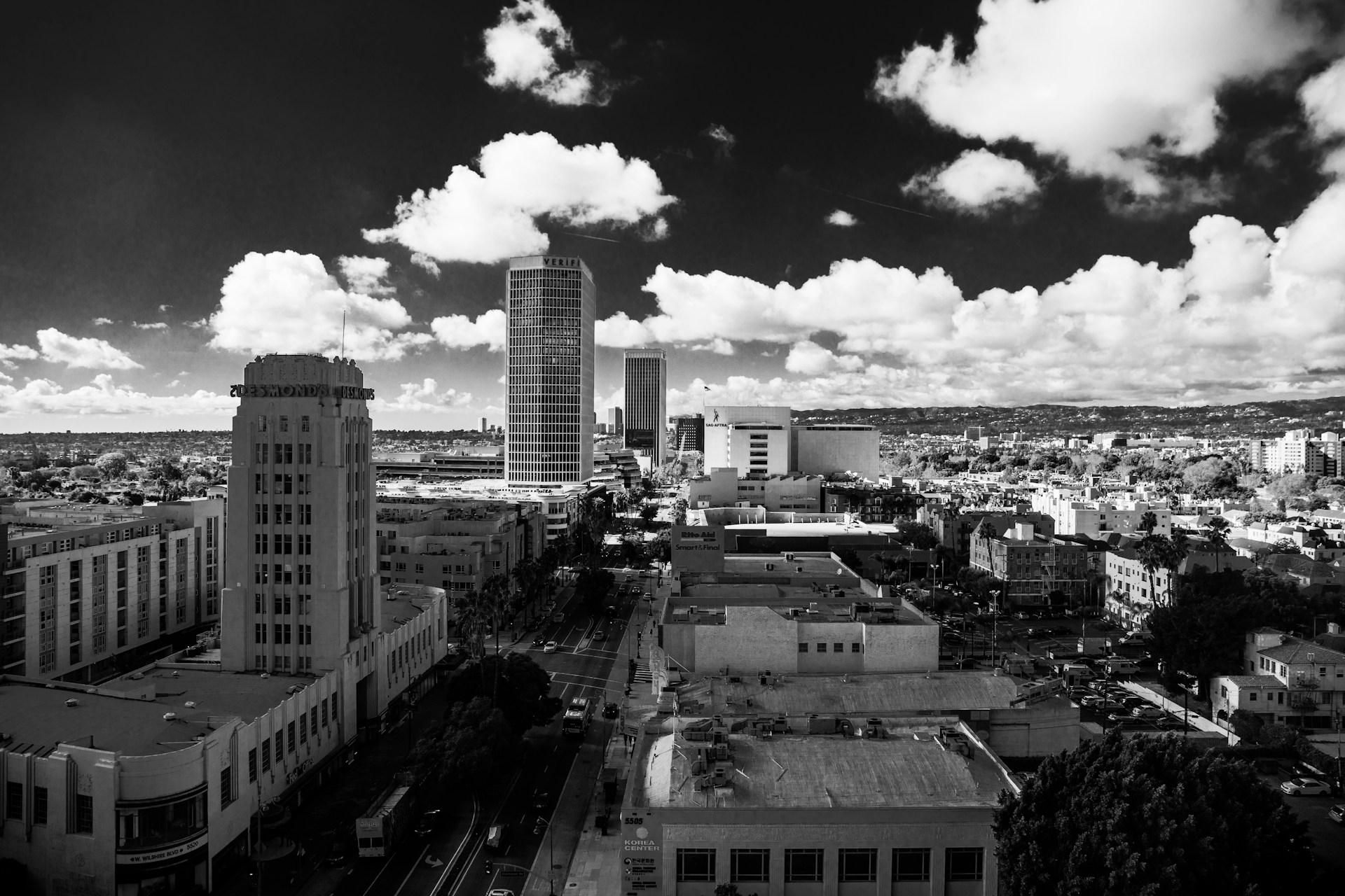Aerial black and white view of the Desmond's building on Wilshire Boulevard in Mid-Wilshire, LA.