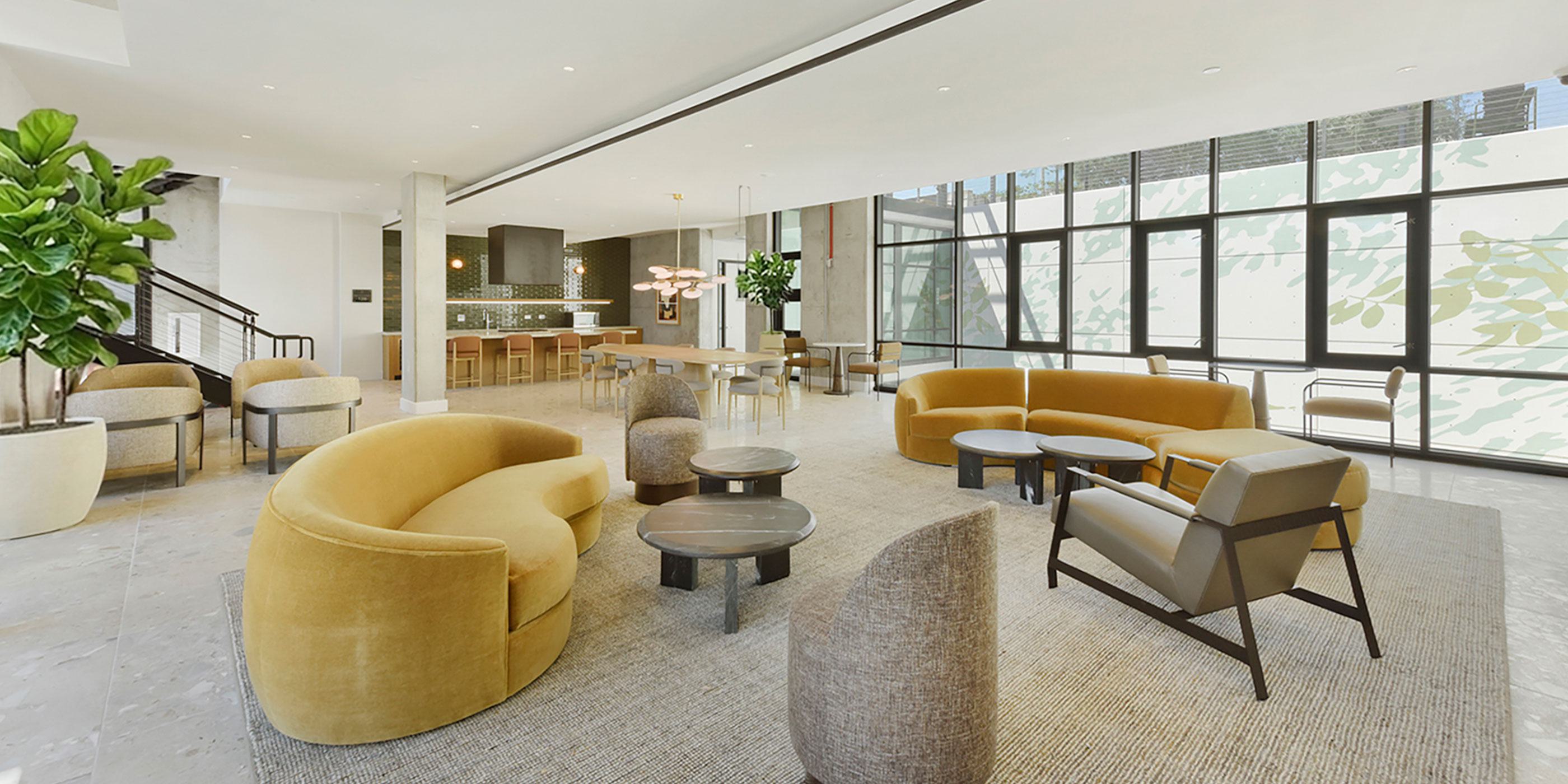 Clubroom images of large windows and lounge seating