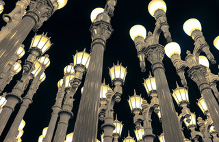 Rendering of several street lights against a black sky