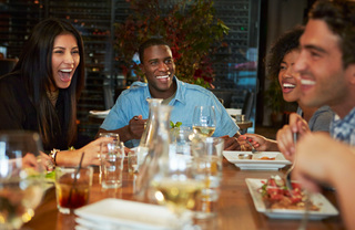 A group of friends dining out together