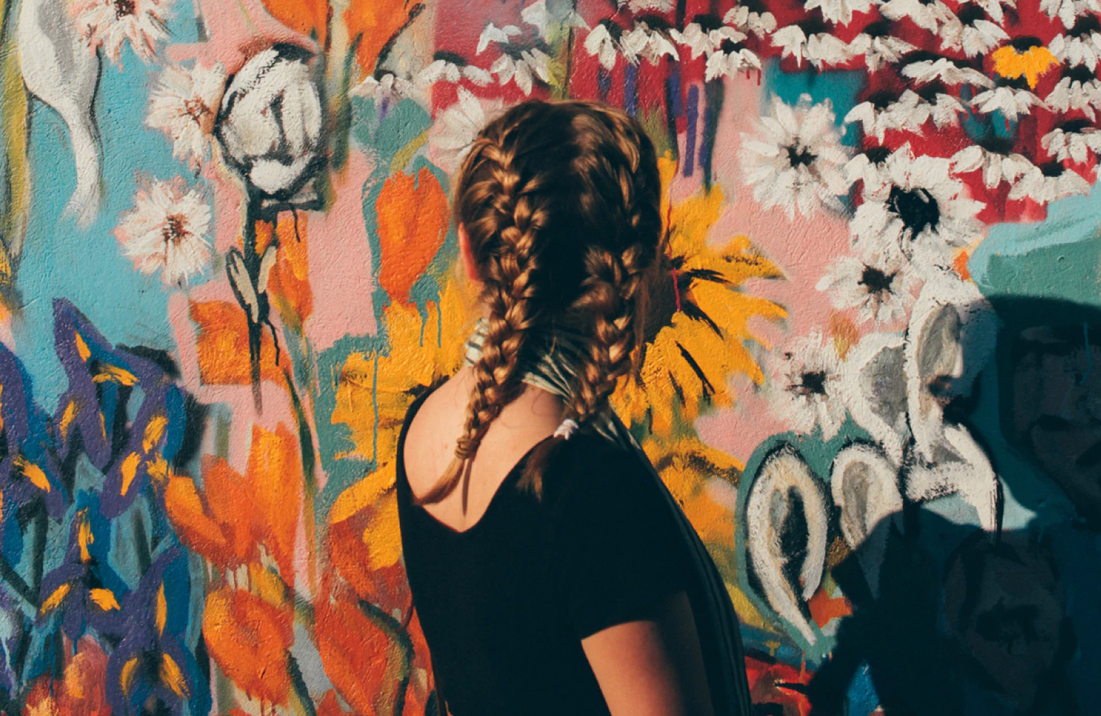 girl passing through an art walk in sacramento