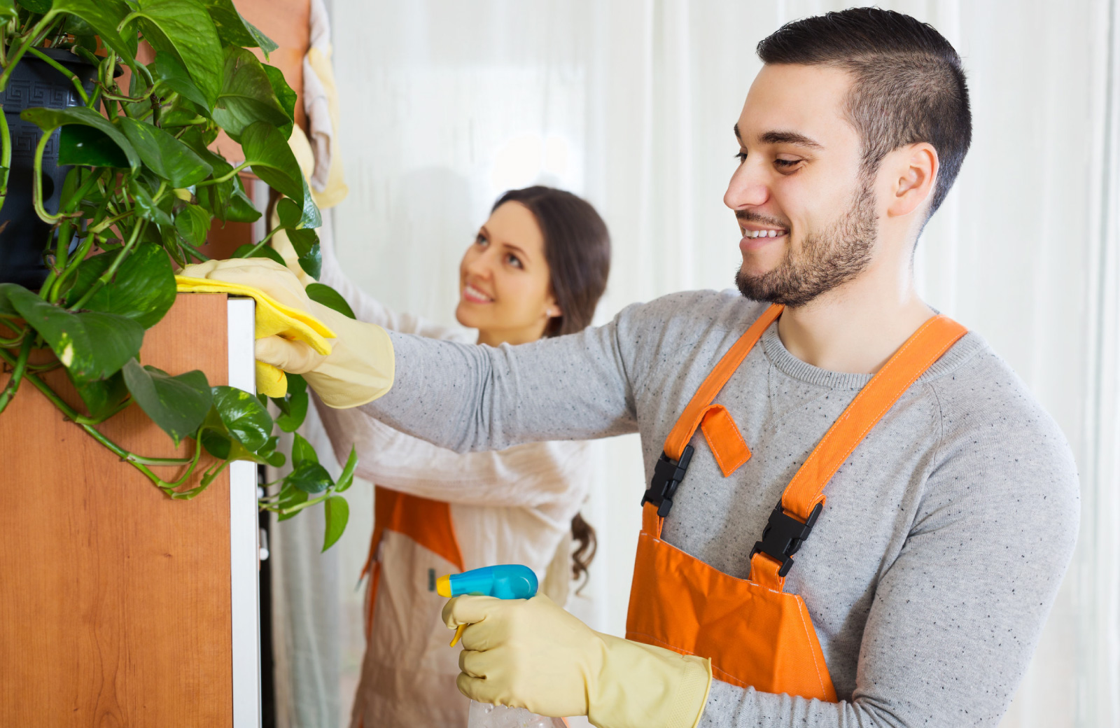couple cleaning house Altana glendale