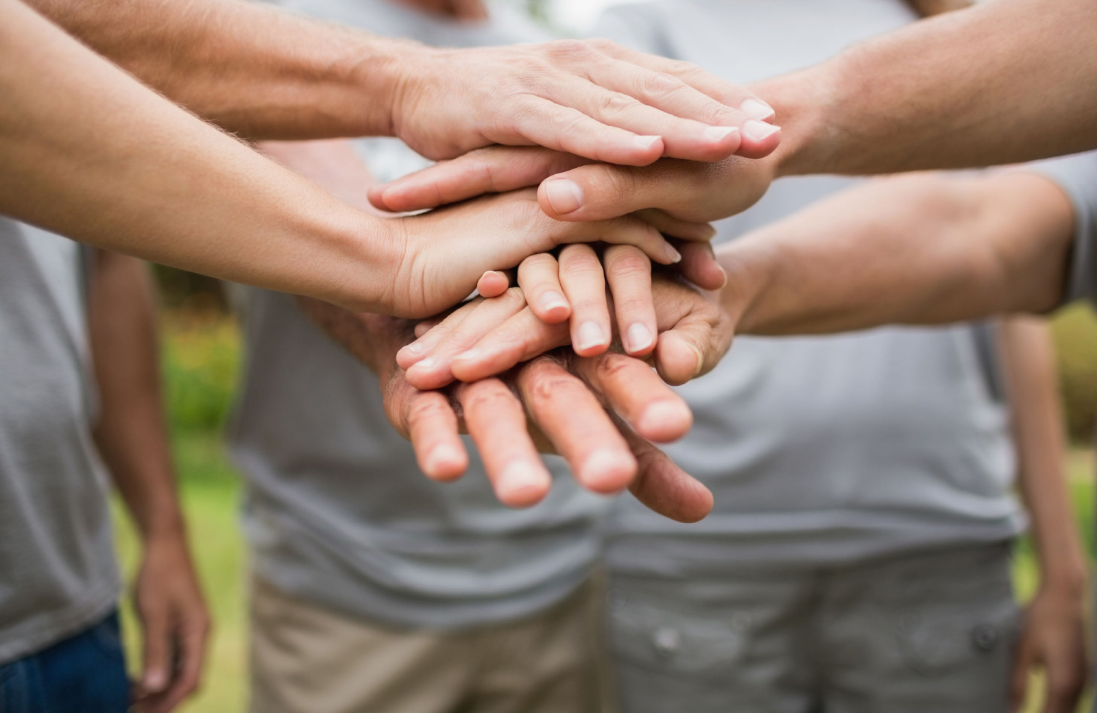 people joining hands - madrid apartments los angeles