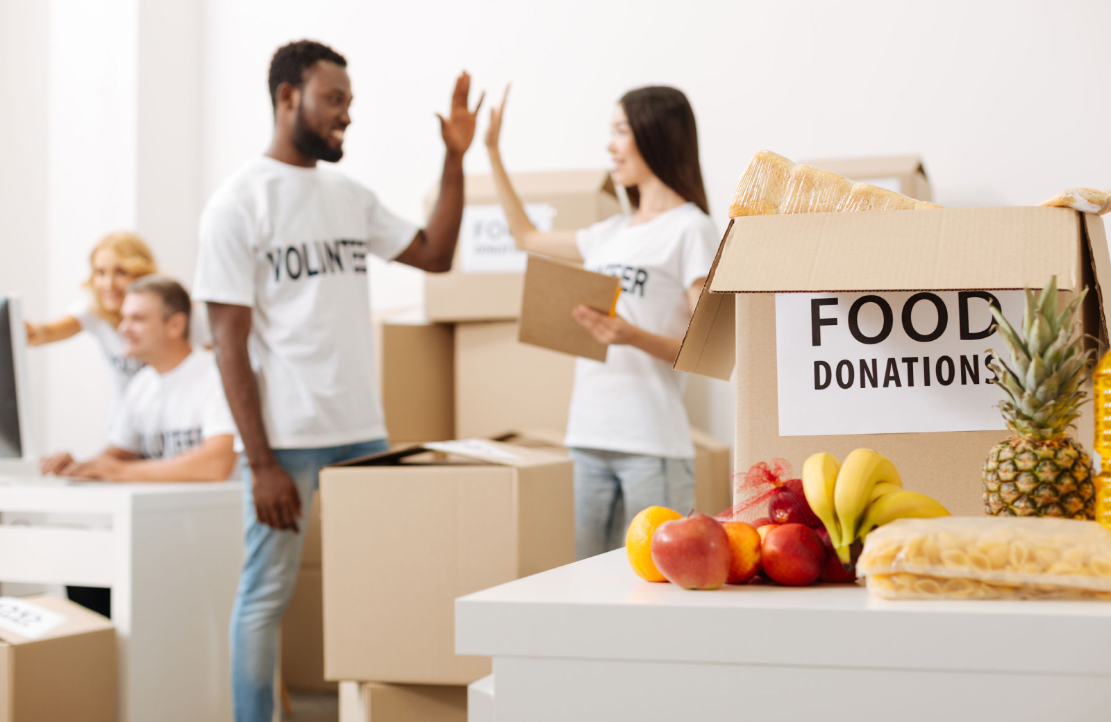volunteers in a food donation drive the henry apartments